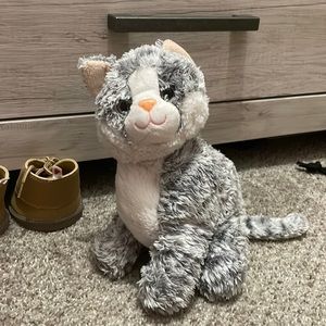 I am selling a Grey Tabby sitting cat from Melissa and Doug.
